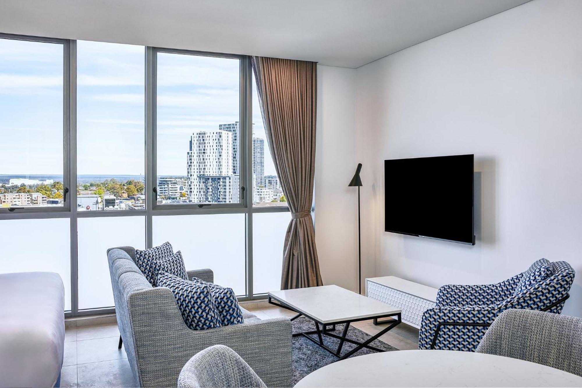 Meriton Suites Liverpool Exterior foto Living room